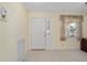 Tiled foyer with window to the right of the front door at 9575 Sw 92Nd Street Rd, Ocala, FL 34481
