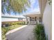 Charming front porch with comfortable seating and well-maintained landscaping at 9575 Sw 92Nd Street Rd, Ocala, FL 34481