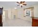Neutral living space with tiled floor and view of the front door at 9575 Sw 92Nd Street Rd, Ocala, FL 34481