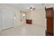Neutral living space with tiled floor and view of the front door at 9575 Sw 92Nd Street Rd, Ocala, FL 34481