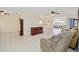 Spacious living space with tiled floor and comfortable seating at 9575 Sw 92Nd Street Rd, Ocala, FL 34481