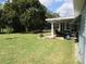 Spacious backyard with nice patio for entertaining and beautiful green grass at 11792 Sw 137Th Loop, Dunnellon, FL 34432