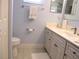 Bright bathroom featuring a sink, toilet, and well-maintained fixtures at 11792 Sw 137Th Loop, Dunnellon, FL 34432