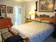 This main bedroom offers a ceiling fan and a full furniture set at 11792 Sw 137Th Loop, Dunnellon, FL 34432