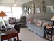 Bright sunroom with tile floors, and neutral toned walls at 11792 Sw 137Th Loop, Dunnellon, FL 34432