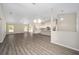 Bright, open-concept living space showcasing the kitchen and dining areas at 13180 Sw 80Th St, Dunnellon, FL 34432