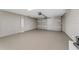 This is a large garage with sealed concrete flooring and automatic door at 15428 Sw 60Th Cir, Ocala, FL 34473