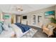 Spacious primary bedroom with a walk-in closet and sliding doors to the bathroom at 15428 Sw 60Th Cir, Ocala, FL 34473