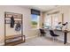 Bright home office space features natural light, dual desks, and convenient entryway storage at 2170 Ne 28Th Ln, Ocala, FL 34470