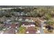 Aerial view of neighborhood homes, featuring community landscaping and tree lined street at 3616 Ne 17Th Ln, Ocala, FL 34470
