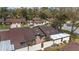 Home featuring a fenced in back patio for privacy and beautiful landscaping at 3616 Ne 17Th Ln, Ocala, FL 34470