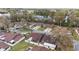 Aerial view of neighborhood featuring townhomes and mature landscaping at 3616 Ne 17Th Ln, Ocala, FL 34470