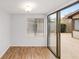 Sunny dining room with wood floors and sliding glass doors to the outdoor space at 3616 Ne 17Th Ln, Ocala, FL 34470