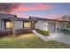 Charming townhome featuring a well-maintained lawn, attached garage, and fresh exterior paint at 3616 Ne 17Th Ln, Ocala, FL 34470
