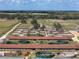 Horse training facility featuring multiple training rings and barns, framed by picturesque landscapes at 4695 Ne 112Th Ln, Anthony, FL 32617