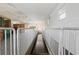 The interior of the barn has metal railings and access to the stables at 4695 Ne 112Th Ln, Anthony, FL 32617