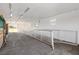 The interior of the barn has metal railings and access to the stables at 4695 Ne 112Th Ln, Anthony, FL 32617