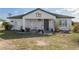 Inviting single-story home enhanced by landscaping and decorative accents at 4695 Ne 112Th Ln, Anthony, FL 32617