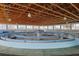 Circular interior space featuring custom-built structures and ample room for various activities at 4695 Ne 112Th Ln, Anthony, FL 32617