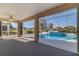 Enclosed pool area featuring a sparkling pool with hot tub and a covered patio for relaxing at 5115 Nw 21St Loop, Ocala, FL 34482