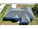 Aerial view of the home and a screened in lanai at 5347 Nw 20Th Pl, Ocala, FL 34482