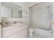 A functional bathroom with a single sink vanity, toilet, and a shower-tub combination at 5347 Nw 20Th Pl, Ocala, FL 34482