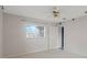 The bedroom offers natural light, carpet floors, neutral walls, and a ceiling fan at 5347 Nw 20Th Pl, Ocala, FL 34482