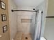 Tiled shower with a built-in bench and niche adding character to the updated bathroom at 5520 Nw 57Th St, Ocala, FL 34482