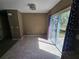 Cozy dining area with tile flooring and sliding glass doors opening to the backyard at 5520 Nw 57Th St, Ocala, FL 34482