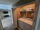 Laundry room adjacent to the main living space and features modern appliances at 5520 Nw 57Th St, Ocala, FL 34482
