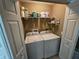 Enclosed laundry room with washer and dryer connections, shelf space, and storage at 5520 Nw 57Th St, Ocala, FL 34482