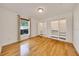 Bright bedroom with wood floors, and closet with sliding doors offers a serene and inviting space at 6307 Se 8Th Ln, Ocala, FL 34472