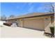 Spacious two-car garage with an extended driveway and well-maintained landscaping at 6307 Se 8Th Ln, Ocala, FL 34472