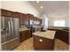 Modern kitchen featuring stainless appliances, granite countertops and a center island at 6307 Se 8Th Ln, Ocala, FL 34472
