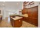 Well-lit kitchen with granite counters, island sink, and ample cabinet space at 6307 Se 8Th Ln, Ocala, FL 34472