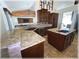 Open concept kitchen with large island, granite countertops and stainless steel appliances at 6307 Se 8Th Ln, Ocala, FL 34472