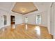 Bright living room with hardwood floors and recessed ceiling at 6307 Se 8Th Ln, Ocala, FL 34472