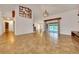 A bright, open living area with large glass doors leading to a beautiful pool area at 6307 Se 8Th Ln, Ocala, FL 34472