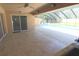Enjoy this covered patio leading out to a screened-in pool area with an outdoor kitchen and plenty of space to relax at 6307 Se 8Th Ln, Ocala, FL 34472