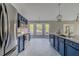 Spacious kitchen with modern appliances, center island and ample counter space at 75 Pine Crse, Ocala, FL 34472