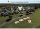 Aerial view of home with golf course, neighborhood, and proximity to World Equestrian Center at 7635 Nw 33Rd Pl, Ocala, FL 34482