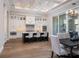 Modern kitchen with a center island, stainless steel appliances, and a breakfast bar at 7635 Nw 33Rd Pl, Ocala, FL 34482