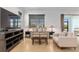 Well-lit living area with neutral tones, comfortable seating, and modern entertainment setup at 7698 Sw 85Th Cir, Ocala, FL 34481