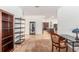 Inviting living space showcasing decor and an open layout with seamless transition to the kitchen at 7698 Sw 85Th Cir, Ocala, FL 34481