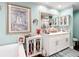 Stylish bathroom featuring a double vanity, decorative cabinets, and large framed mirror at 7955 Sw 62Nd Ct, Ocala, FL 34476