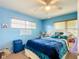 Cozy bedroom with natural light offers a peaceful retreat at 7955 Sw 62Nd Ct, Ocala, FL 34476