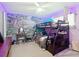 A furnished bedroom featuring a bunk bed and a ceiling fan with lights at 7955 Sw 62Nd Ct, Ocala, FL 34476