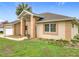 Charming single-Gathering home featuring manicured landscaping and a welcoming front entrance at 7955 Sw 62Nd Ct, Ocala, FL 34476