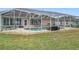 Enclosed pool area offering a private backyard retreat and ample space for outdoor activities and relaxation at 7955 Sw 62Nd Ct, Ocala, FL 34476