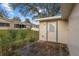 View of the backyard and storage area showcasing the home's exterior at 8533 Sw 93Rd Pl # C, Ocala, FL 34481